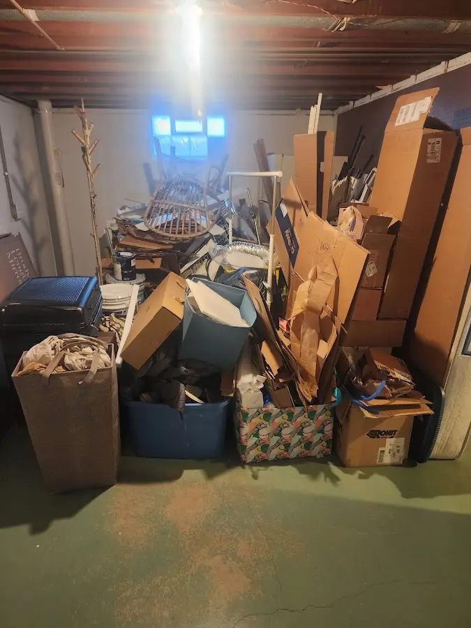 Roll-off dumpster container at job site for 2 Yard Dumpster Rental in Meridian